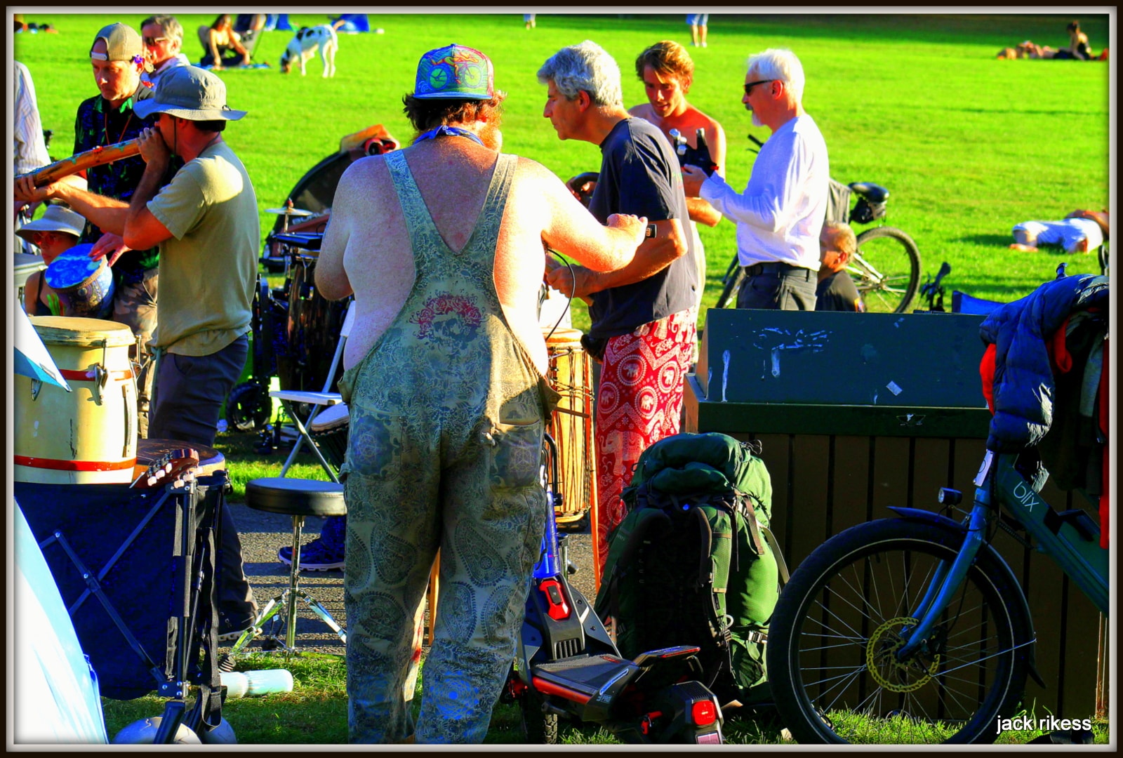 Drum Circle — suspenders and hat drummer