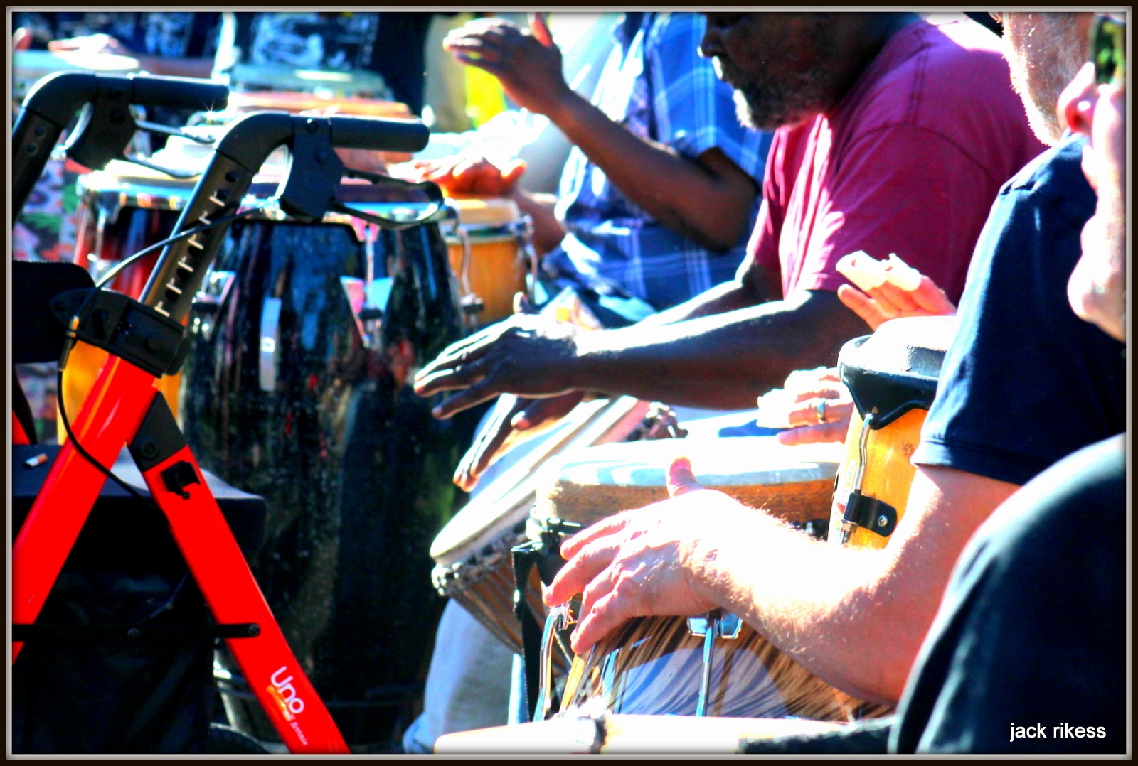 Drum Circle — tie-dye flag and guitarist