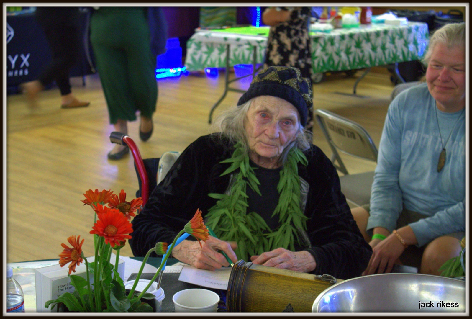 Pebbles — at an event wearing a cannabis lei