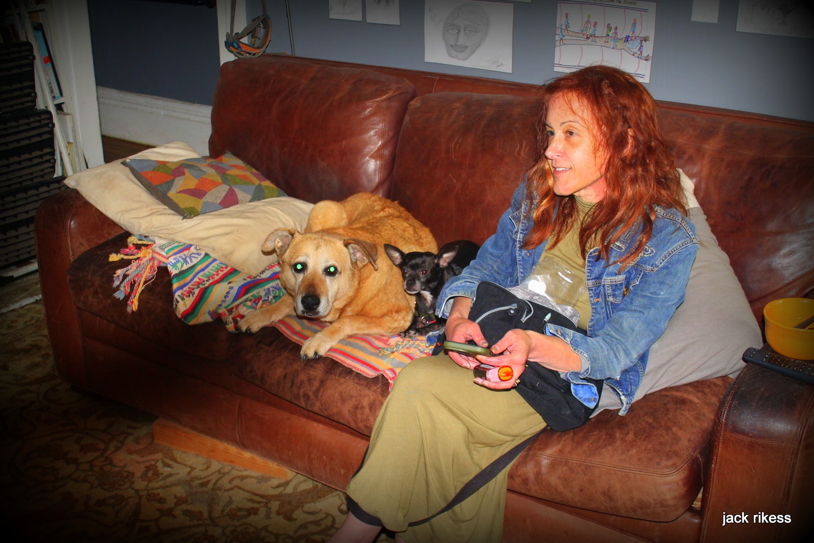 Stella and Friends — woman with red hair sitting on sofa with Stella and chihuahua