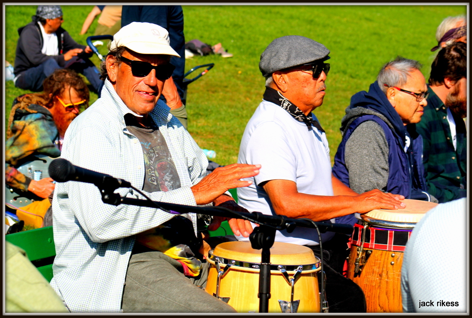 Drum Circle — conga players in sunglasses