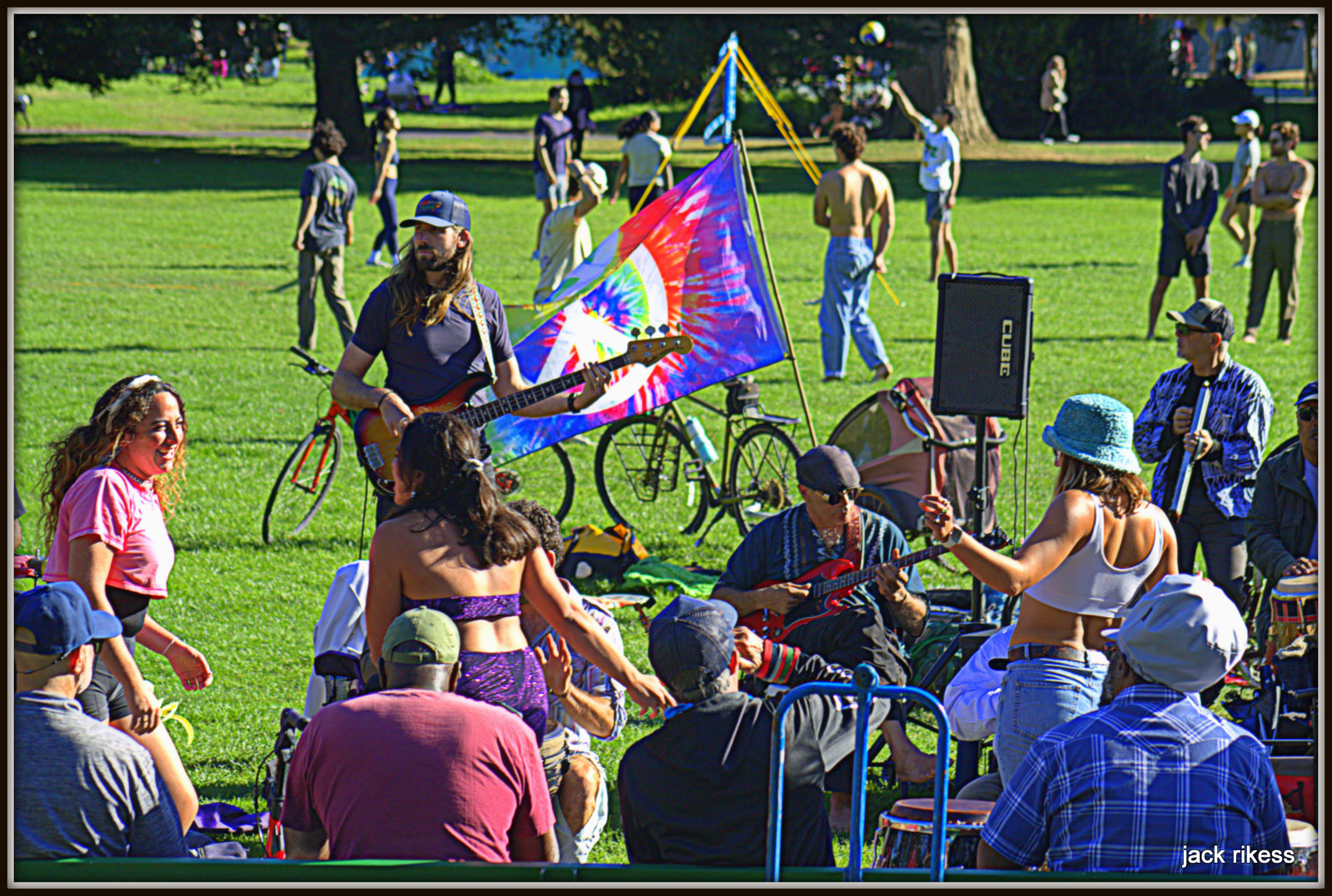 Drum Circle — black and white maracas player